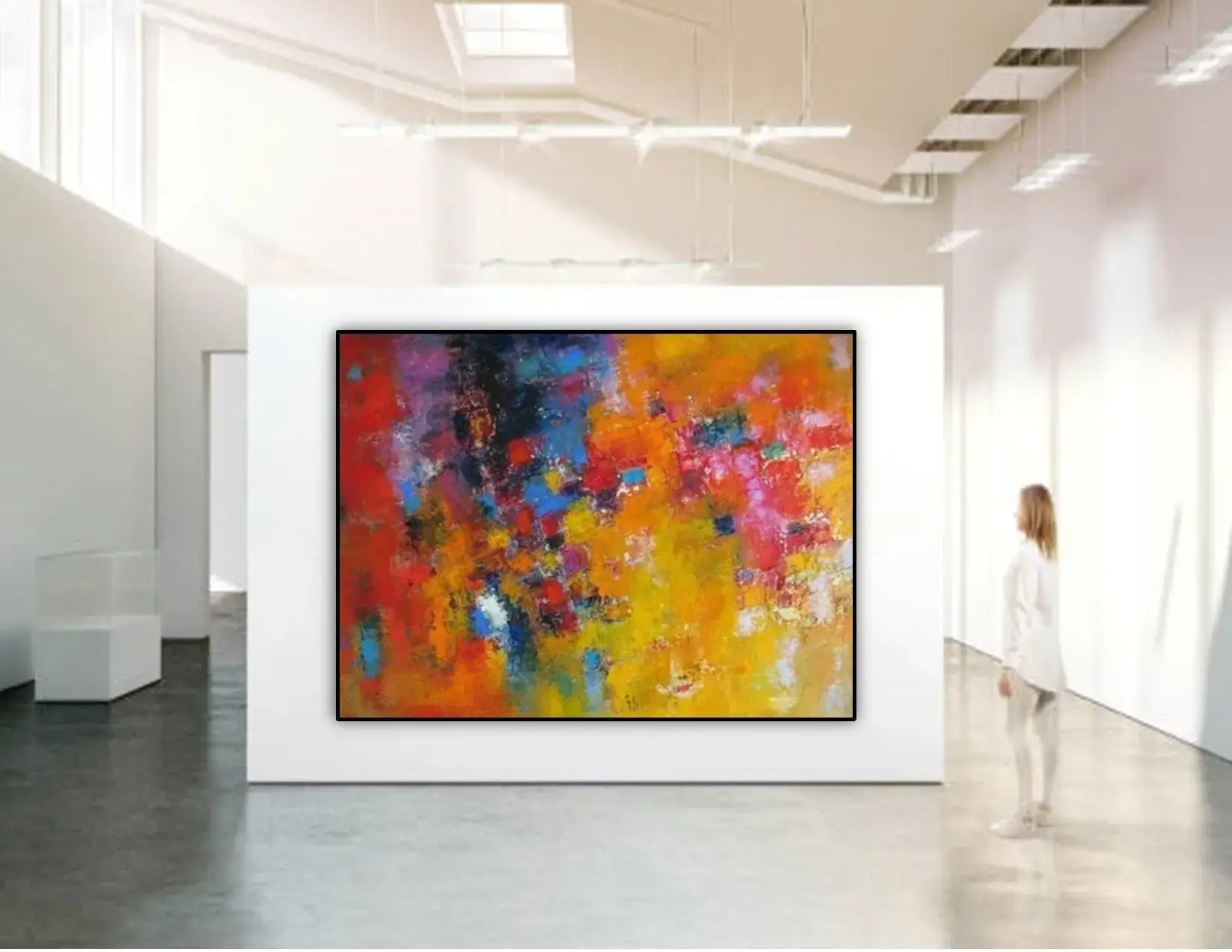 A wall with bold, colorful abstract art